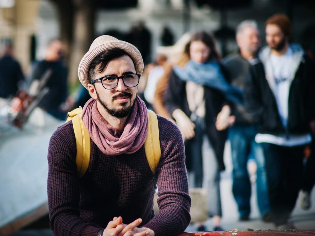 Photo of man in crowd